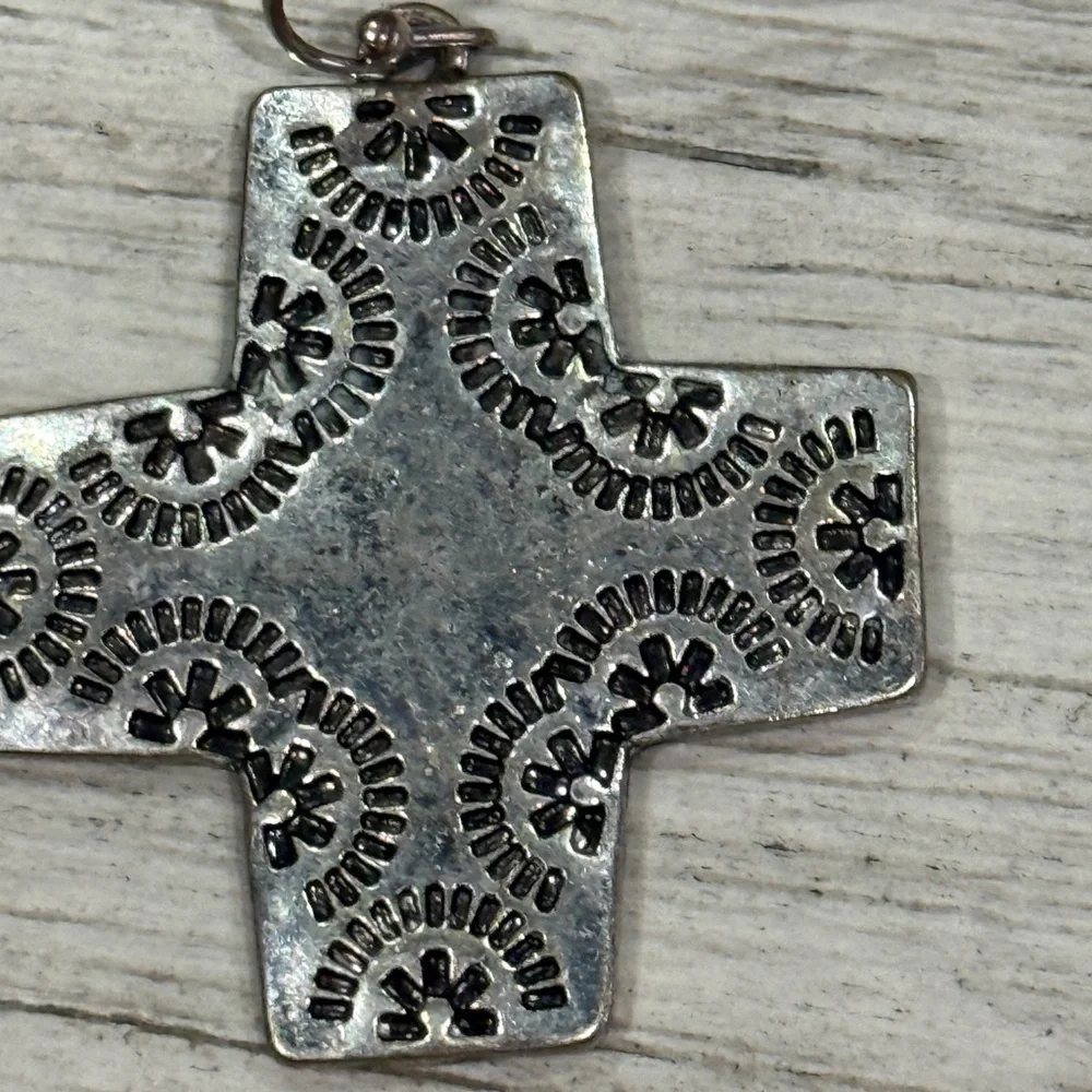 Vintage cross earrings Navajo ,pressed design w/a crystal on back of 1 earring